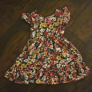 I am selling a formal dress. It has the colors pink, yellow, red, size is 10/12